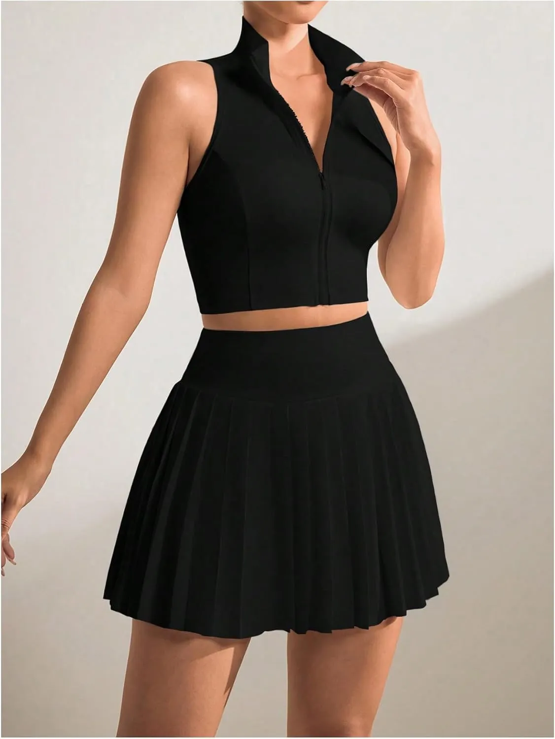 MakeMeChic Women's 2 Piece Athletic Outfit Mock Neck Full Zip Vest Crop Tops and Pleated Skirt Set