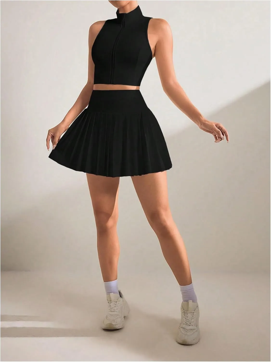 MakeMeChic Women's 2 Piece Athletic Outfit Mock Neck Full Zip Vest Crop Tops and Pleated Skirt Set